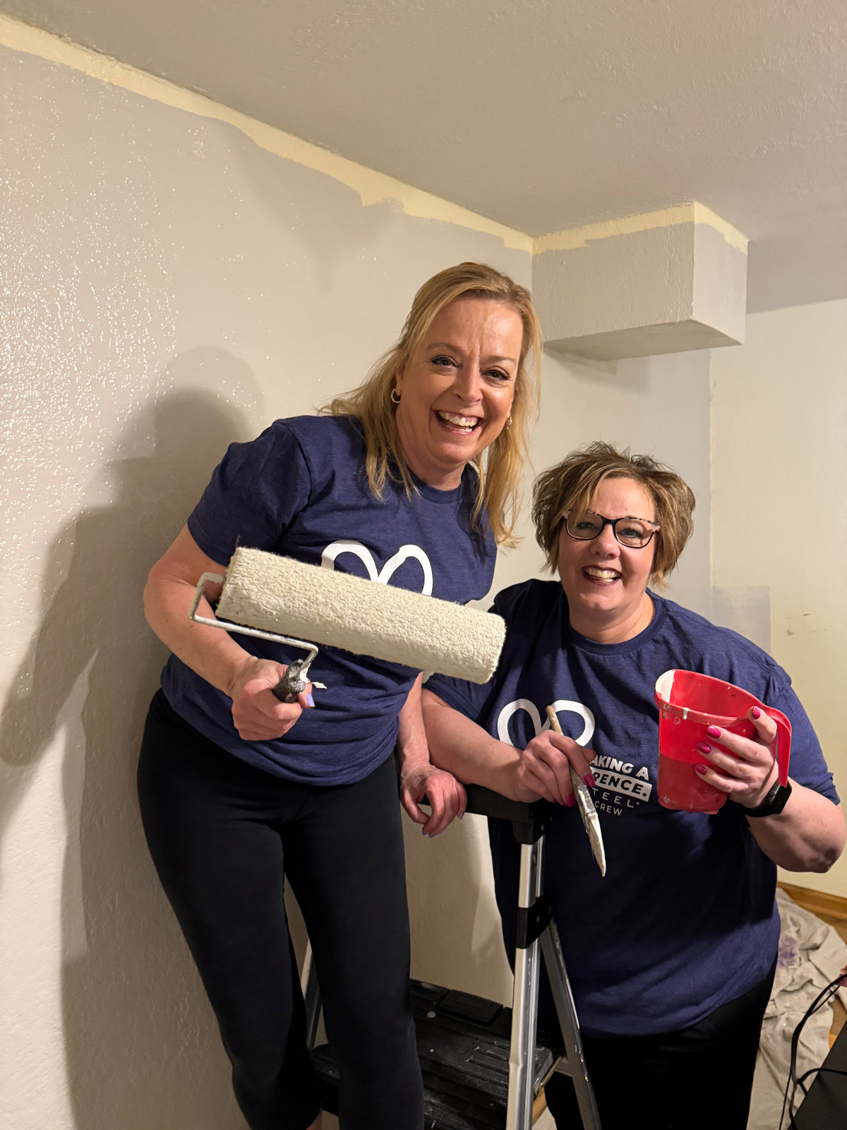 Two Flexsteel employees volunteering in impactful home improvement